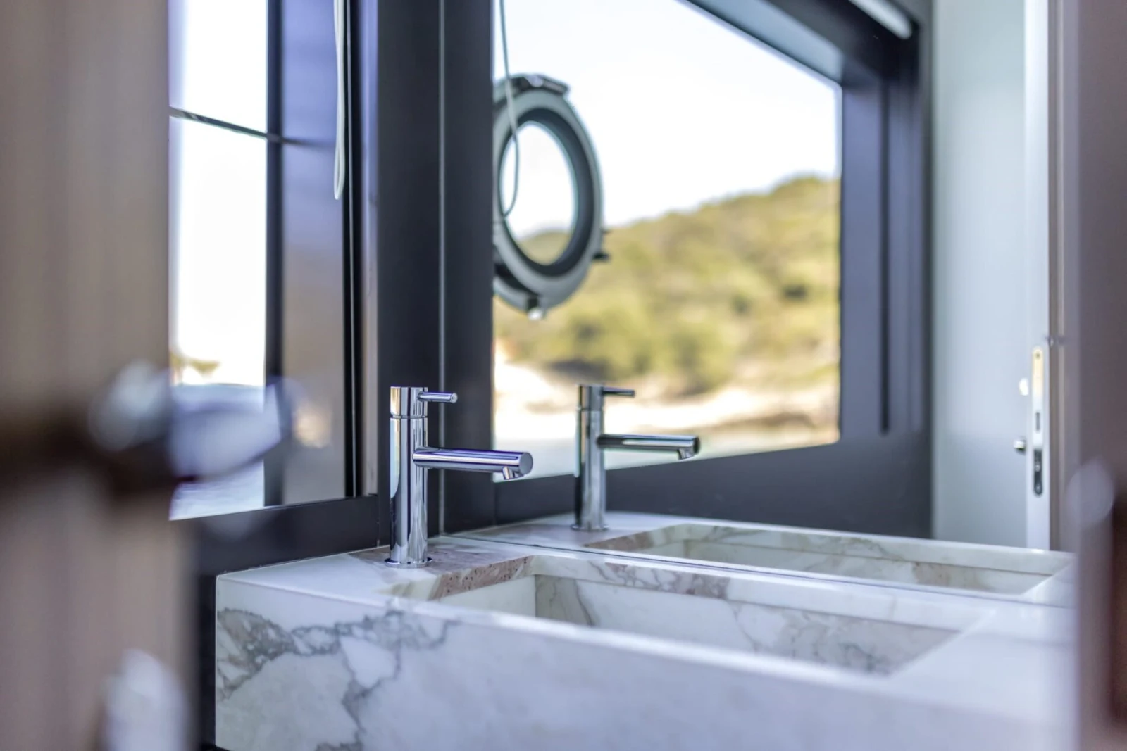 Marble ensuite detail aboard YOYITA II