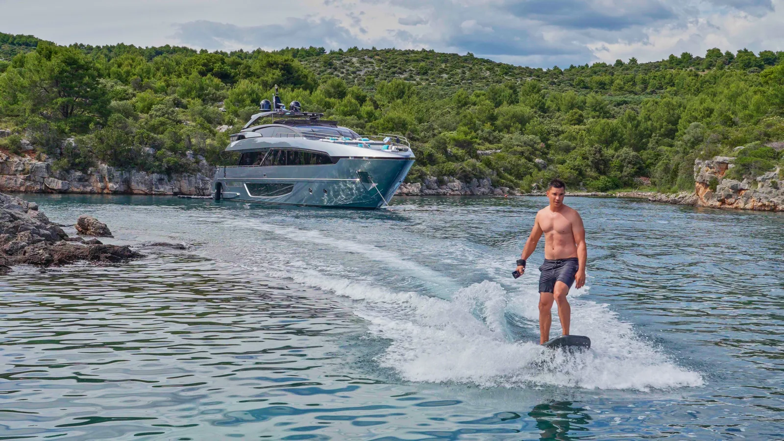 A powered board ridden alongside YOYITA II